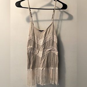 Tan tank top with fringe accent